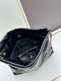 Black quilted chain tote bag