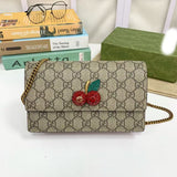 GG Supreme canvas mini bag with cherries