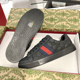 Men's Ace Series GG Embossed Leather Low-Top Sneakers - Black |625787 1XK10 1000